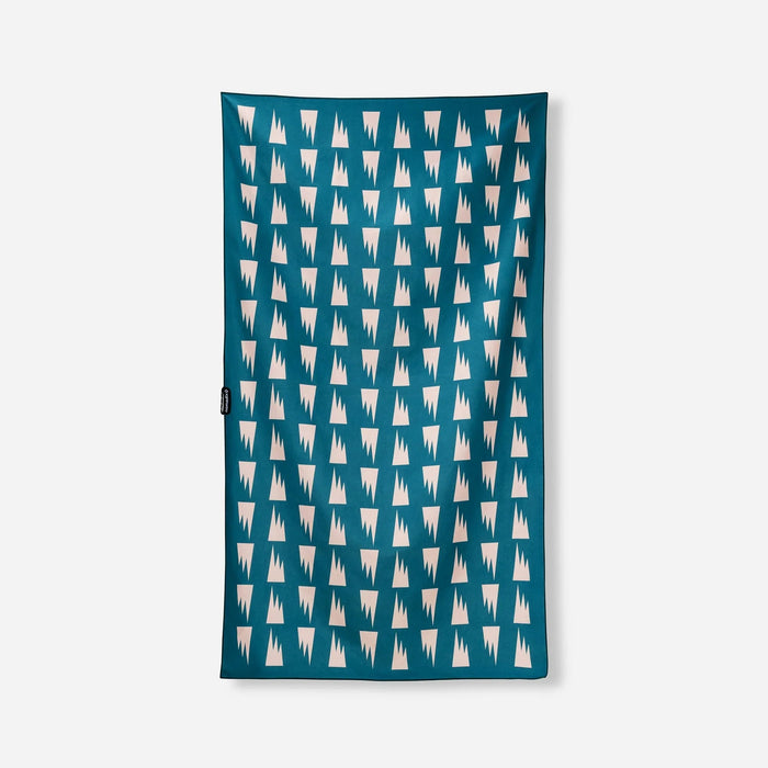 Teal microfiber towel with geometric triangle pattern displayed flat against white background