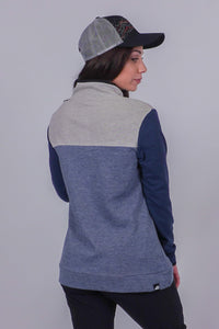 Women's color-block fleece pullover, back view, with gray, dusty blue, and navy panels