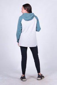 Women's pullover hoodie with dusty blue sleeves and hood, heather gray body, back view