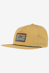 Mustard yellow nylon snapback hat with mountain scene patch and rope brim detail, left angle view