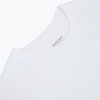White athletic tank top with rounded neckline and subtle color accents, front view