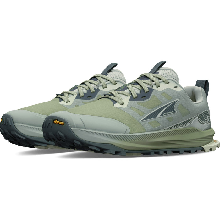Women's trail running shoes in sage green with Vibram outsole, shown as a pair at an angle