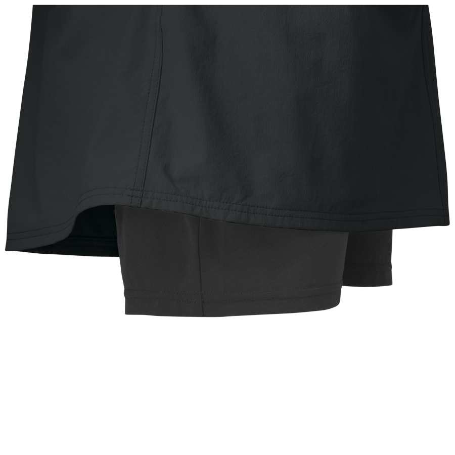 Black athletic skort with built-in shorts shown folded to display layered design