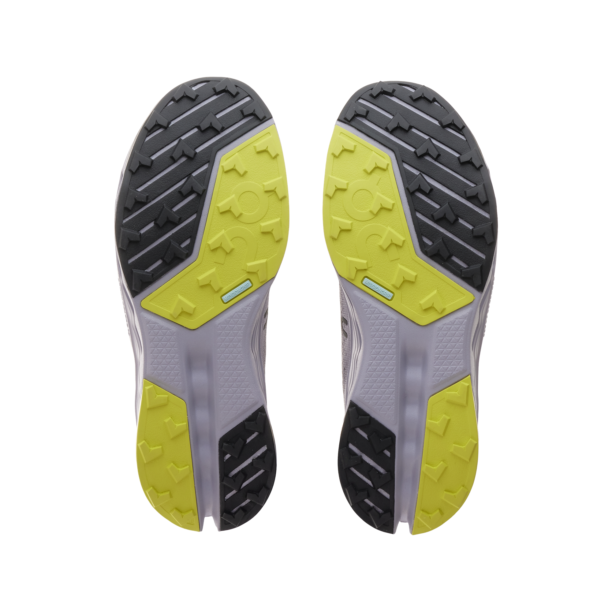 Trail running shoe sole view showing gray, yellow and black rubber traction pattern
