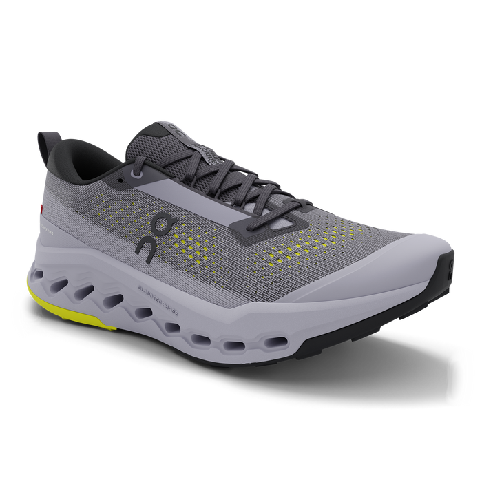 Light grey trail running shoe with perforated sole, mesh upper, and lime accent details