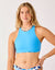 Women's high-neck crop bikini top in bright blue, reversible with floral print, front view