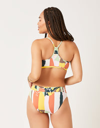 Bikini bottom with colorful geometric pattern shown from back view on model